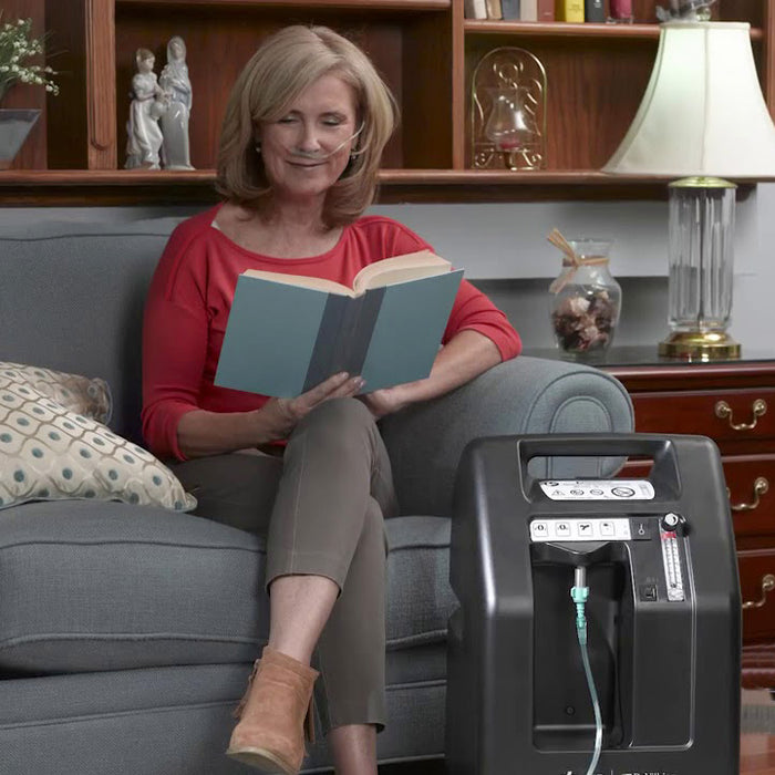 Person using the Drive Devilbiss Home Oxygen Concentrator